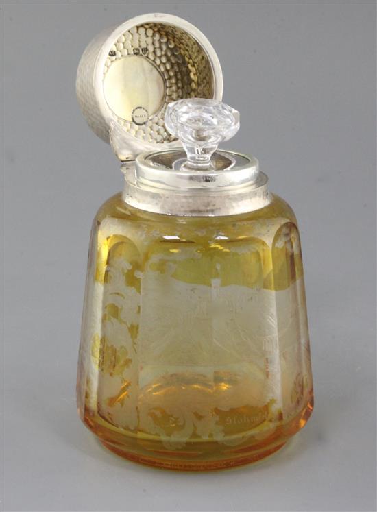 A German amber coloured spar glass perfume bottle, late 19th century, total height 15cm